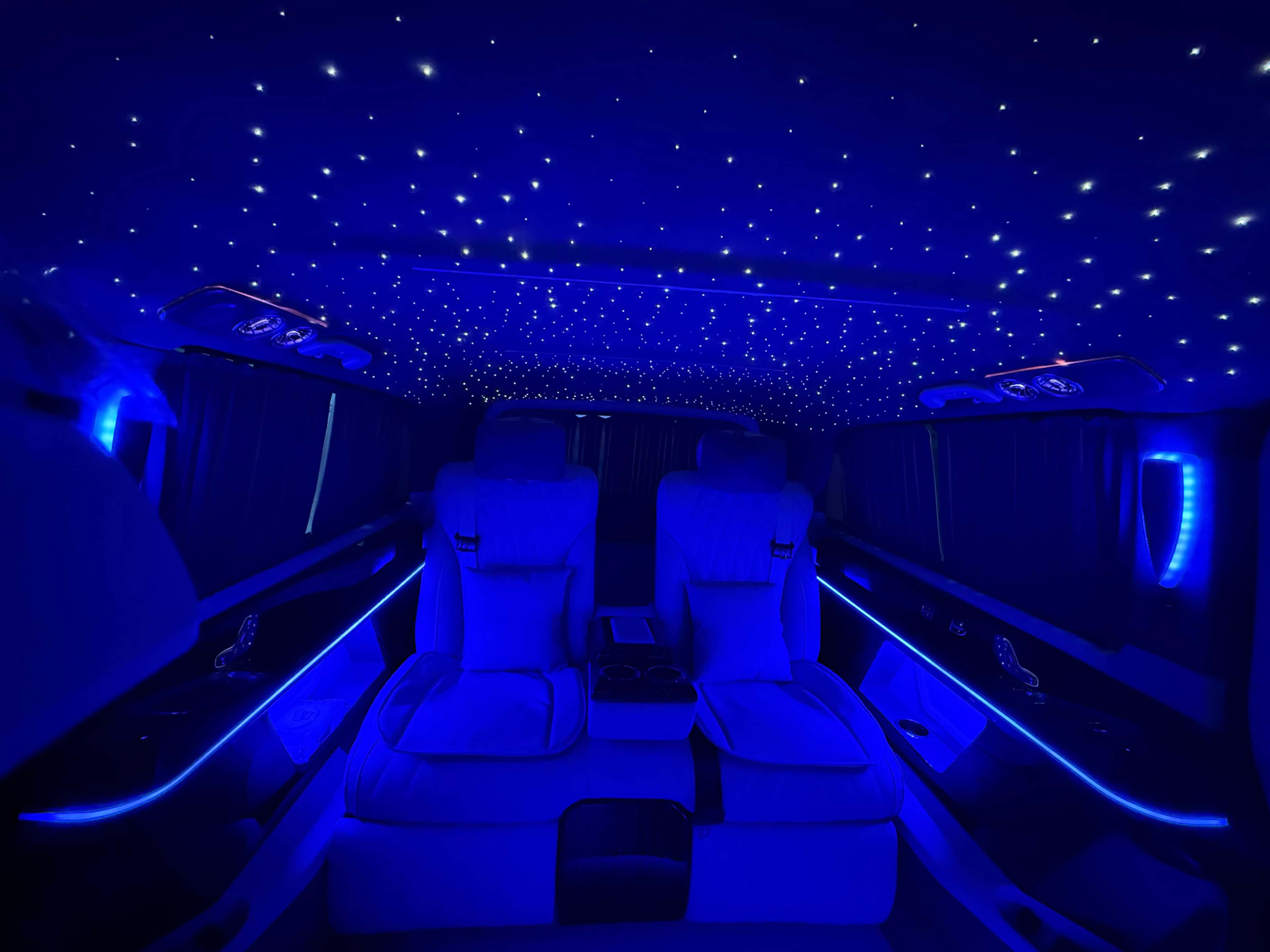 VIP van cabin with blue ambient lighting