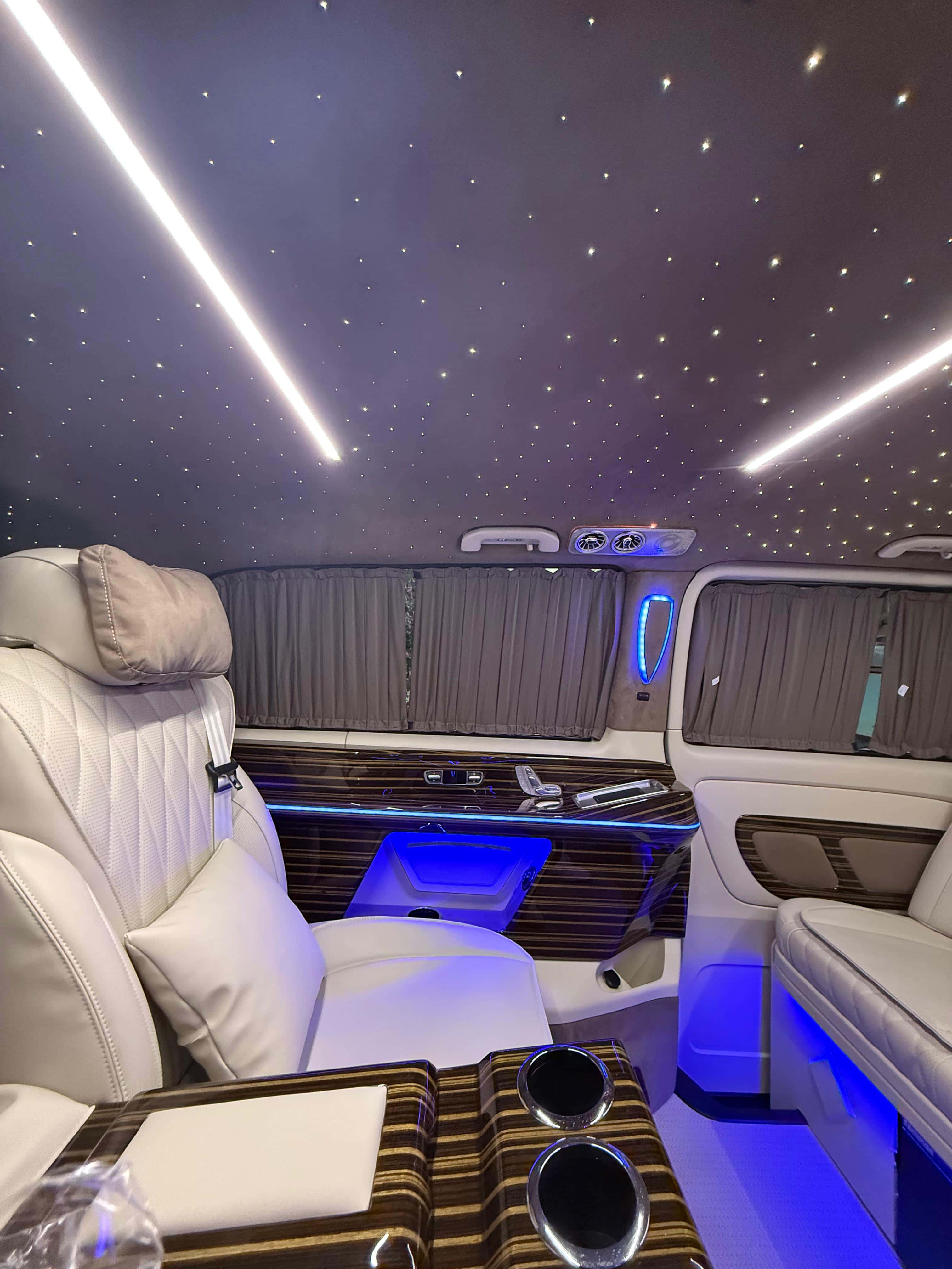 White leather seats with ambient lighting
