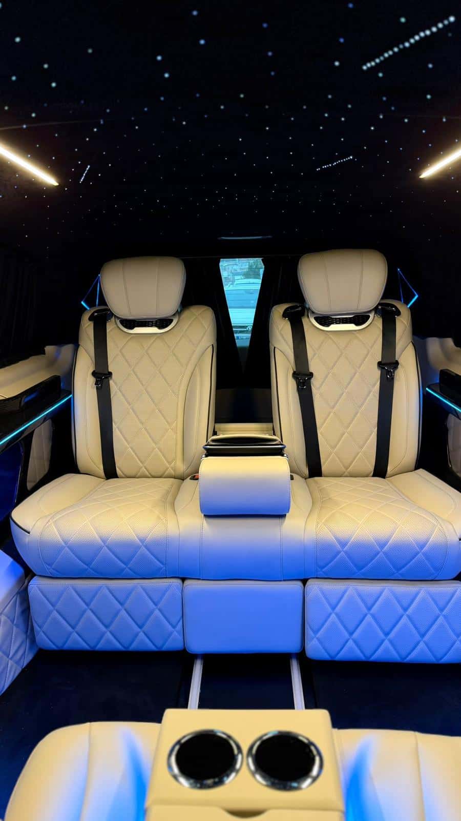 White VIP seats with cup holders